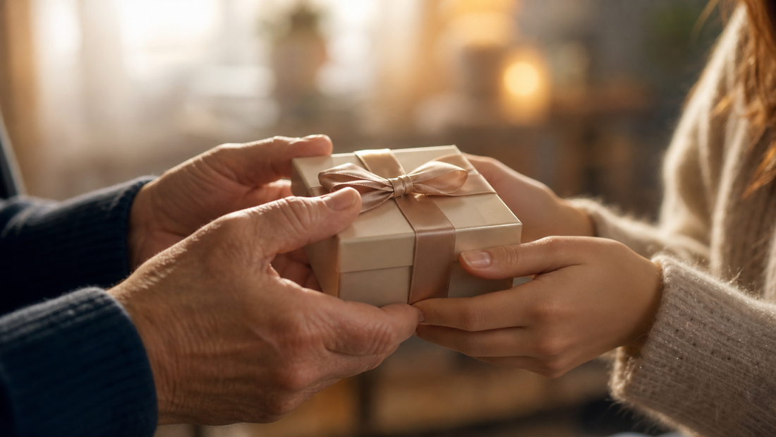 Hands exchanging a sentimental jewelry gift to mend a relationship.