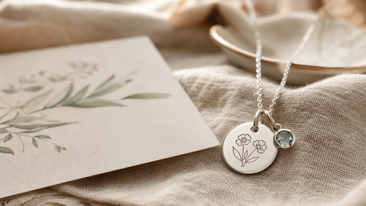 Custom engraved silver necklace with a birthstone and a heartfelt message card, perfect for Mother's Day 2026.
