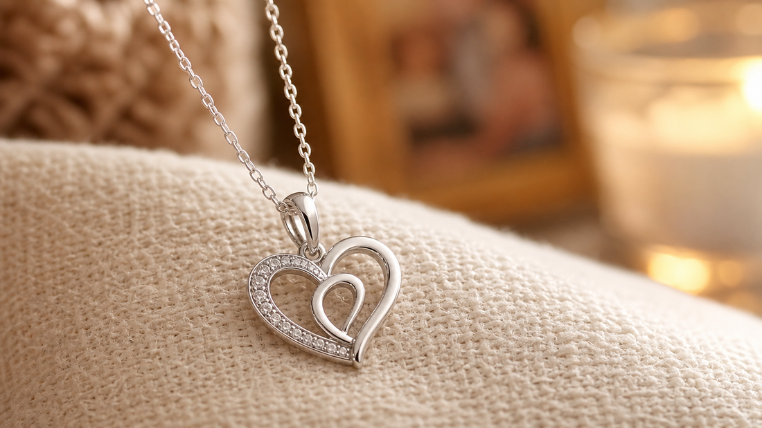 Elegant sterling silver pendant with an interlocking heart design, symbolizing strong family bonds and emotional connection.