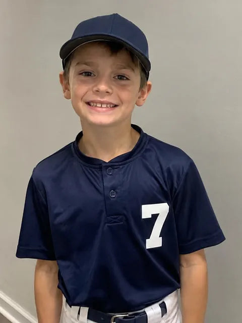 Example: a kid in a baseball uniform, half body